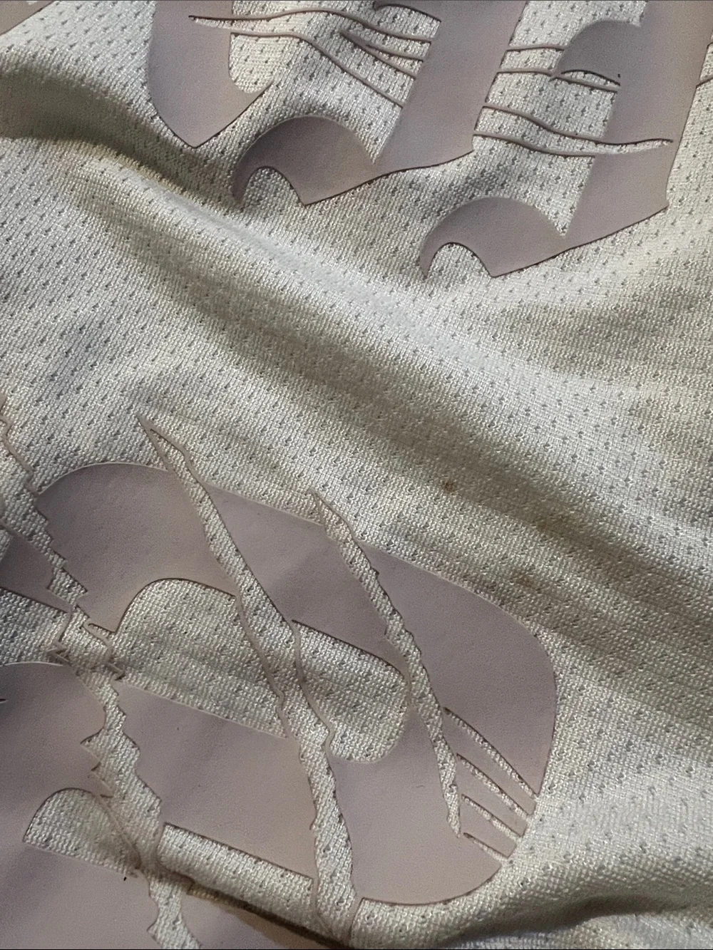 Nike Men’s White Athletic Shorts with Pale Pink Graphic